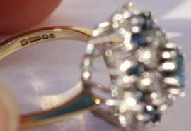 GERESERVEERD 18 kt gouden ring 1 ct diamanten met saffieren