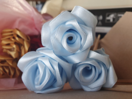 Handmade silk roses on birchwood