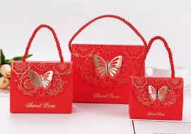 Premium luxury giftbags with laser-cut gold foil butterfly motif and rope hanger