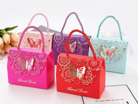 Premium luxury giftbags with laser-cut gold foil butterfly motif and rope hanger