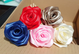 Handmade silk roses on birchwood