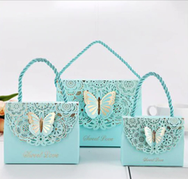 Premium luxury giftbags with laser-cut gold foil butterfly motif and rope hanger