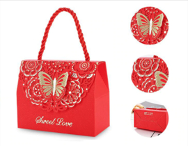 Cadeautasjes met laser gesneden gouden folie vlinder motief en touw hengsel