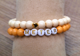 Set armbanden meter perzik - creme