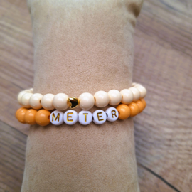 Set armbanden meter perzik - creme