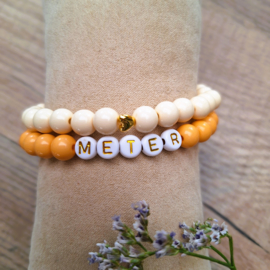 Set armbanden meter perzik - creme