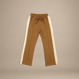 Broek met gouden hartjes bies