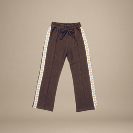 Broek met gouden hartjes bies