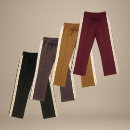 Broek met gouden hartjes bies