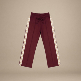 Broek met gouden hartjes bies