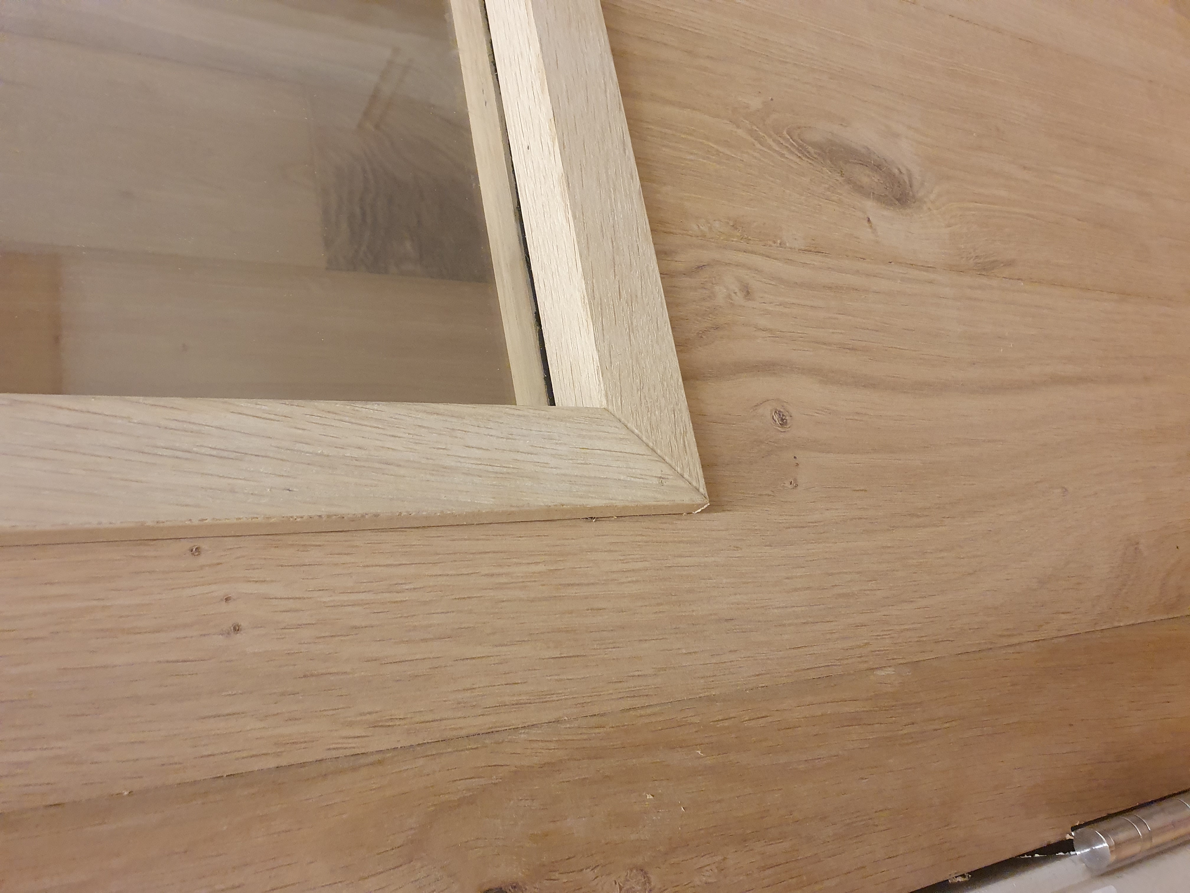 Binnendeur eiken met glas in houten frame