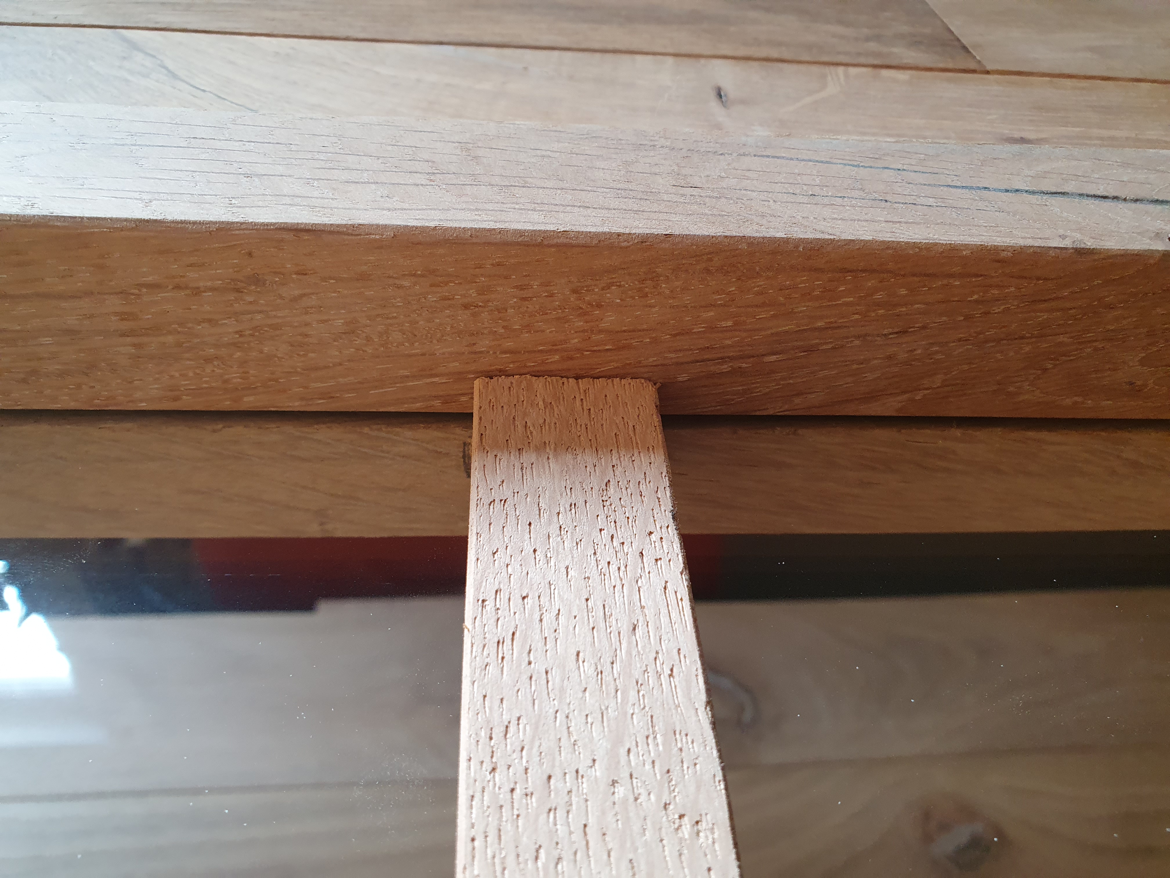 Binnendeur 63x201,5 eiken met glas in houten frame met een houten kruis