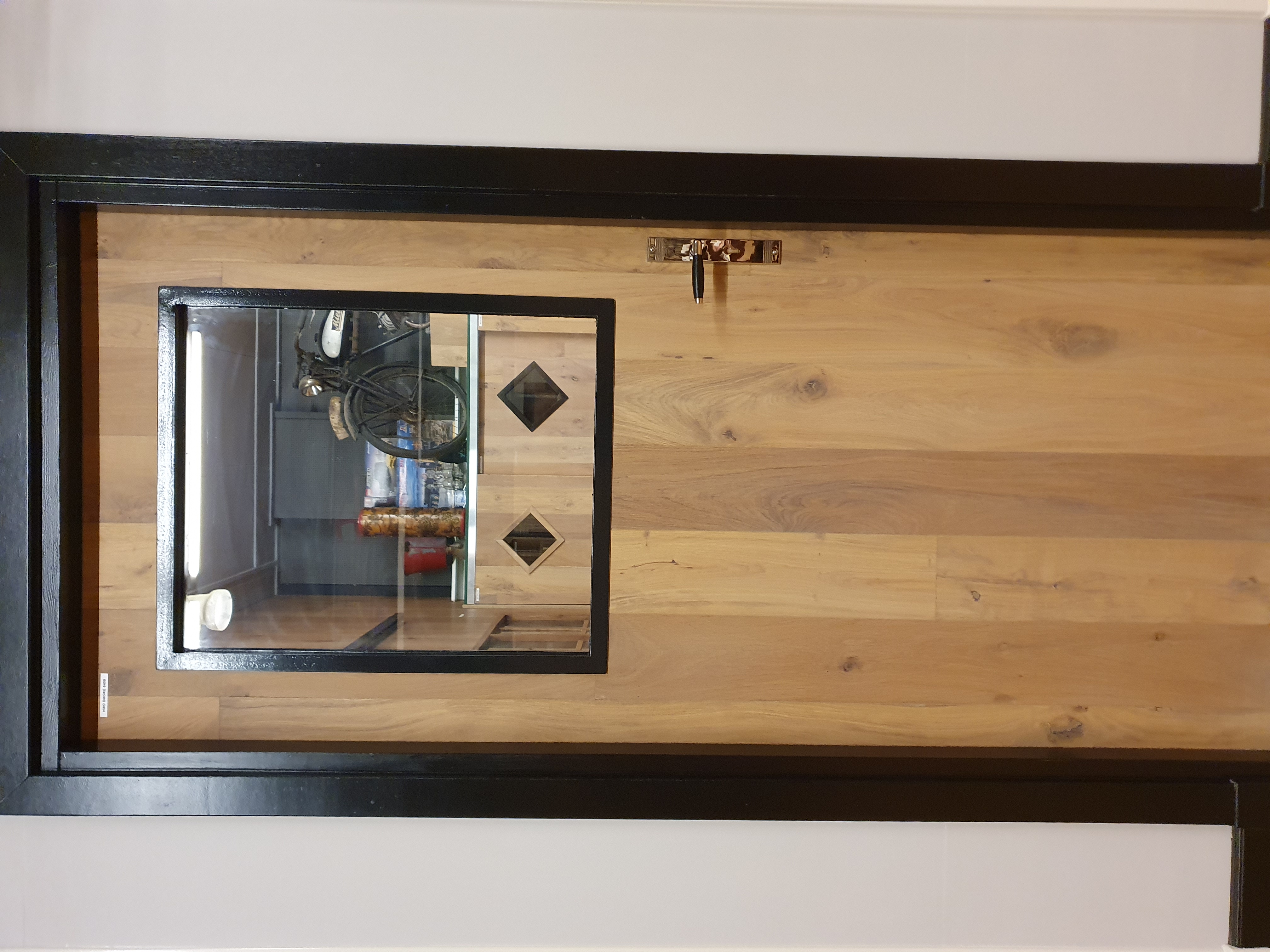 Binnendeur eiken met glas in stalen frame
