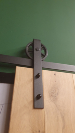 Schuifdeur eiken met glas in stalen frame