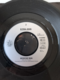Elton John - You gotta love someone