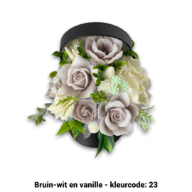 Zeepbloemen in ronde doos met deksel er achter