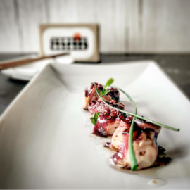 Octopus in pikante olijfolie