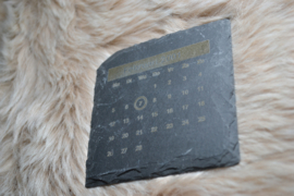 Leisteen onderzetter met speciale datum