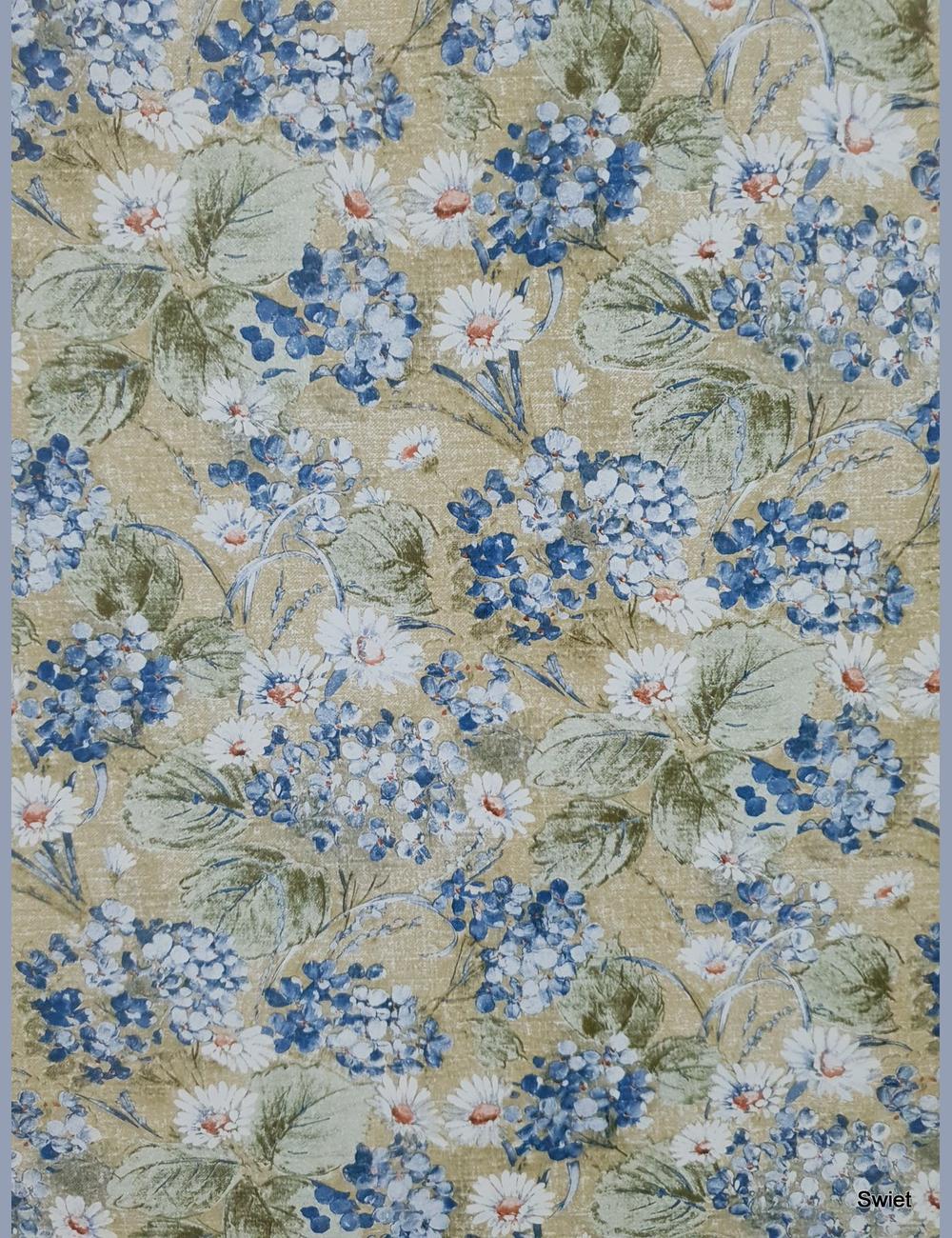 Blauwe bloemen op jute