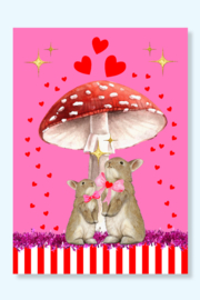 Liefdevolle roze, konijnen wenskaart samen onder de rode paddenstoel met witte stippen.