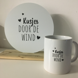 Troost mok "kusjes door de wind"