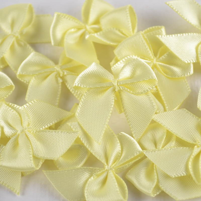Satijnen Strikje – Pastelgeel
