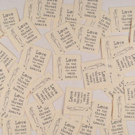 Sticker Love Is The Thread Mends Hearts