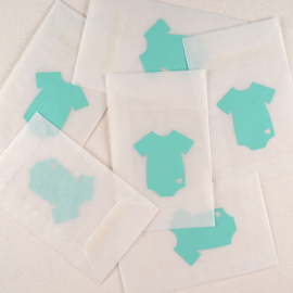 Zakje pergamijn met een mint romper-design