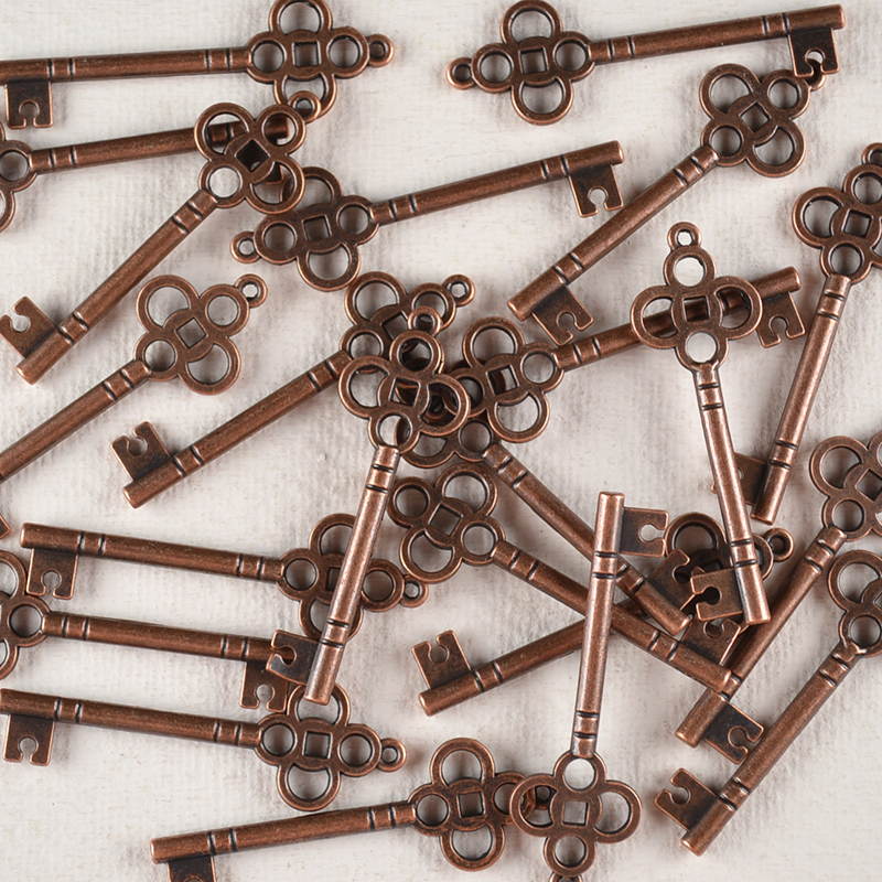 Sleuteltje Metaal Koper – Rond Detail Vintage