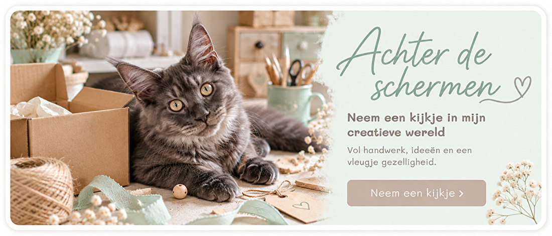 Creatieve werkplek van Create4joy met cadeautjes, materialen en poes Lotte
