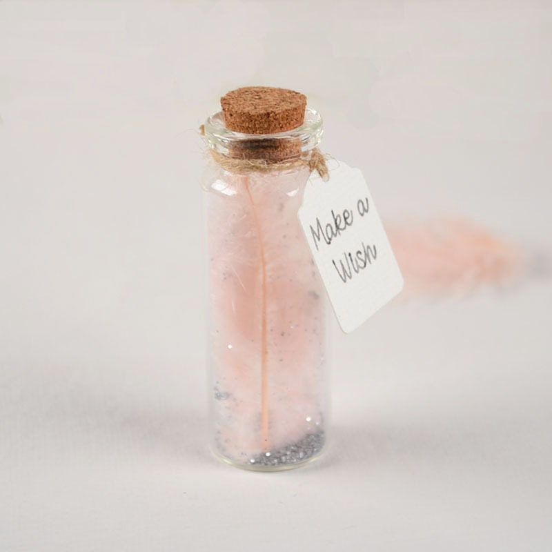Glazen wensbuisje met roze veertje, glitters en label Make a Wish