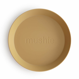 Mushie plates - round Mustard