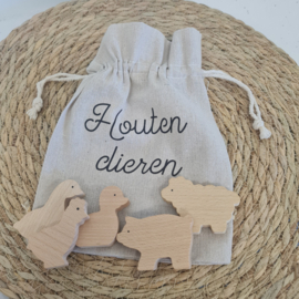 Houten dieren in zakje met naam