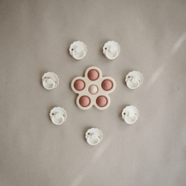 Mushie Press toy flower rose/blush/shifting sand.