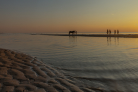 Zonsondergang op het strand