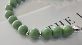 Connectie stuk groene glaskralen (zilver)