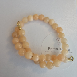 Calciet Peach 50/50 beads