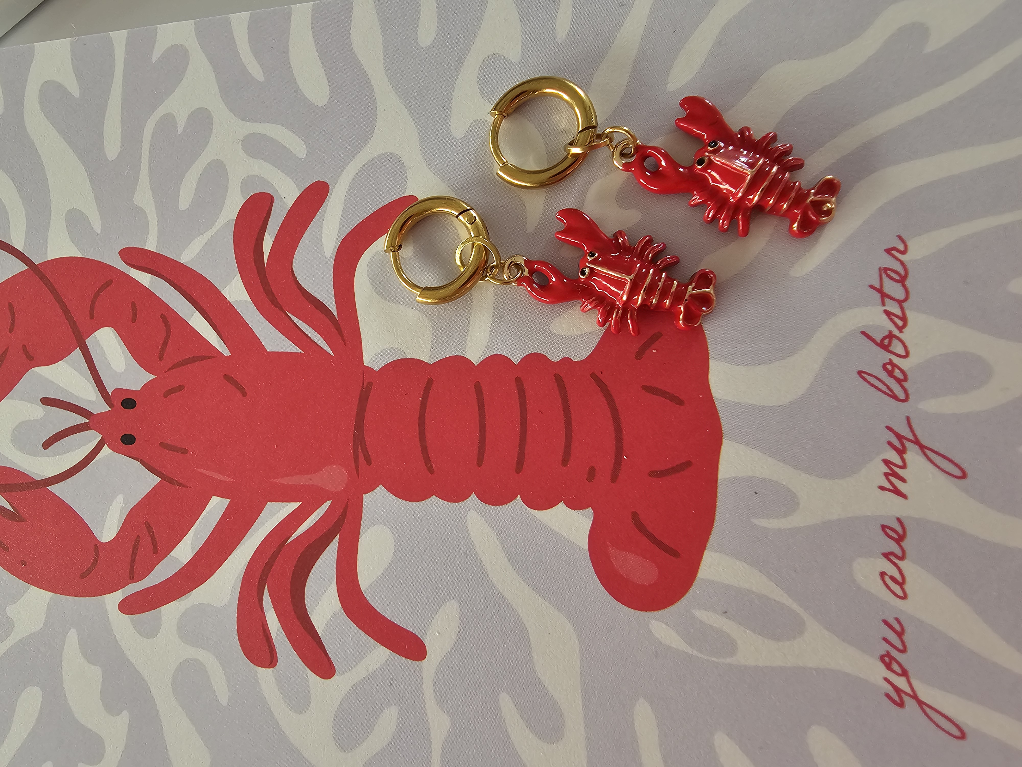 Lobster oorbellen op kaartje