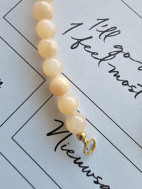 Calciet Peach 50/50 beads