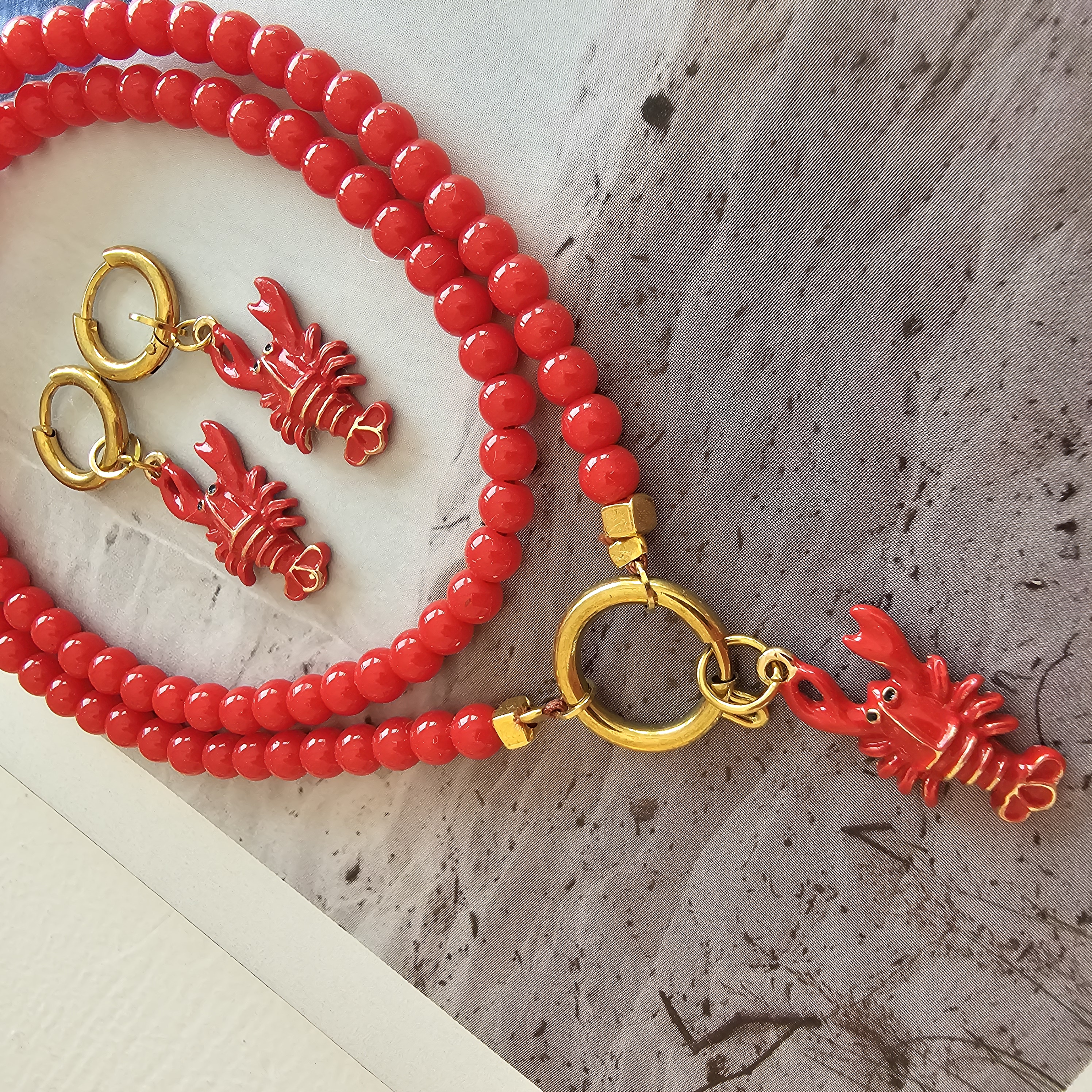 Setje You are my Lobster Koraal ketting en oorbellen