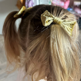 Haar knipjes met strik