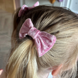 Haar knipjes met strik