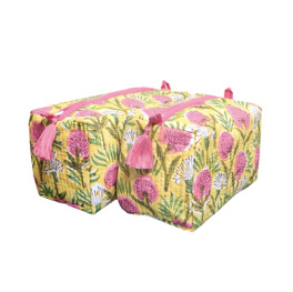 Toilettas gele bloem