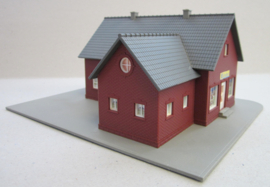 Woonhuis met winkel