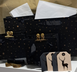 18 delig zwart - goude ster - cadeautasjes