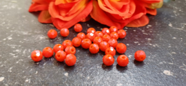 Facet kralen 6 mm Vermilion red pearl shining coating, ongeveer 55 stuks