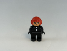 Coureur zwart overall, rode helm Duplo