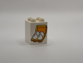 Eieren in doos op blok hoog wit Duplo