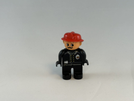 Brandweerman zwart pak en rode helm Duplo
