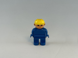 Bouwvakker blauwe kleding en gele helm Duplo